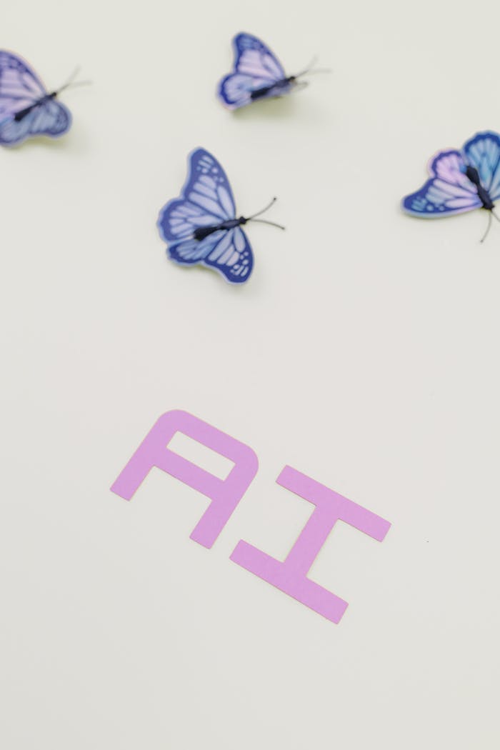 Purple letters AI with artistic butterfly pattern on white surface, symbolizing futuristic technology.